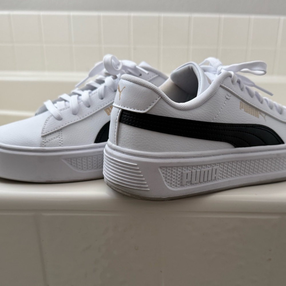 Puma White and Black Sneakers with Sleek Design